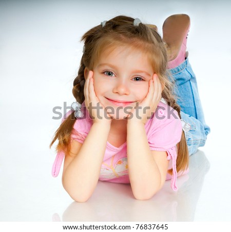 beautiful little girl isolated on a white background