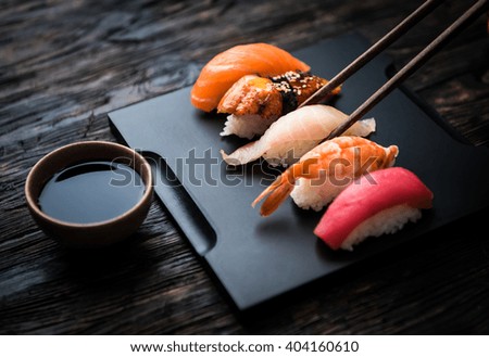 Similar – Image, Stock Photo Fresh sushi with chopsticks on table