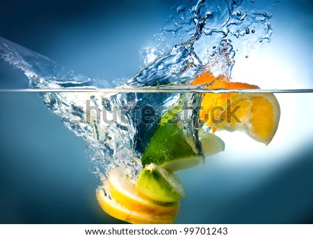 citrus fruits fall into the water