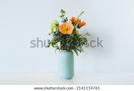 Similar – Image, Stock Photo colorful bouquet in vase on table with Lightleak