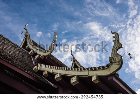 Thai art style at roof top of Buddhist temple with gable apex in Chiangmai, Thailand
