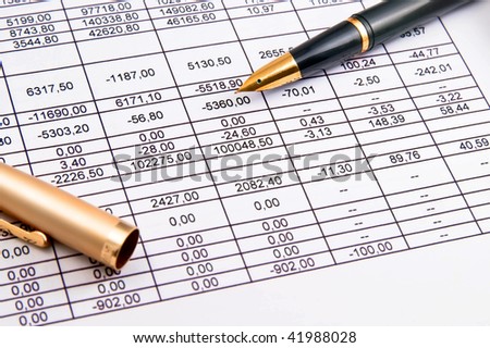 A  pen and financial statement.