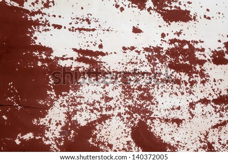 Red and white paint on old boat