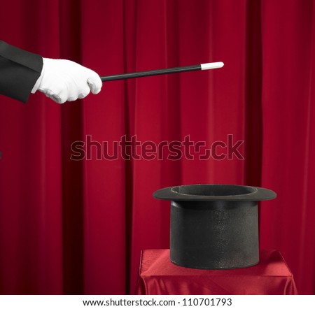 Magician Holding Magic Wand and Top Hat