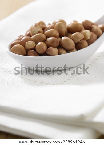 spoon  full of ground nuts