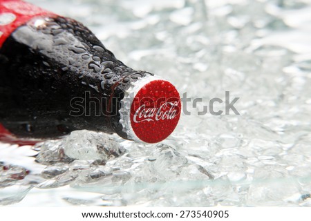 kuala Lumpur,Malaysia 15th April 2015,Editorial photo of Classic Coca-Cola Bottle in crushed ice.