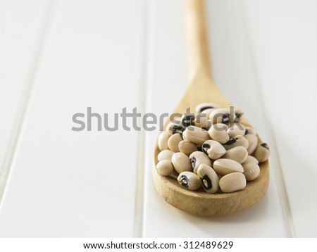 black eye bean on the wooden spoon