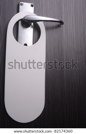 blank sign on the door handle