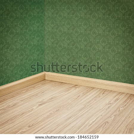 Interior of Old Room with a Wooden Floor and Green Wallpaper