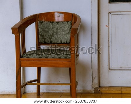 Similar – Image, Stock Photo Vintage wooden chair next to trash bin on the public street