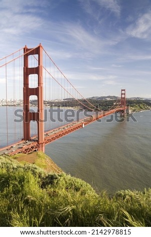 The Golden Gate Bridge against a blue sky in San Francisco.  Stock fotó © 