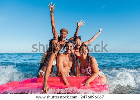 Similar – Image, Stock Photo Happy multiracial women lying together on grass