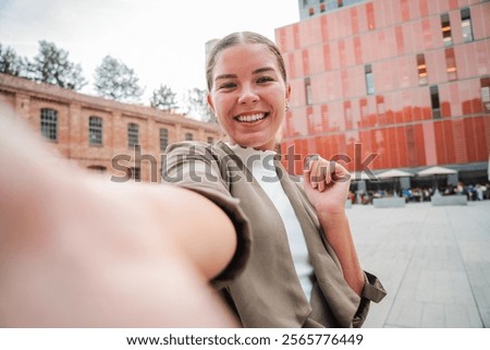 Similar – Image, Stock Photo Delighted teen woman taking selfie on smartphone