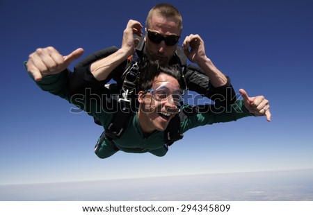 Tandem jump with smile.