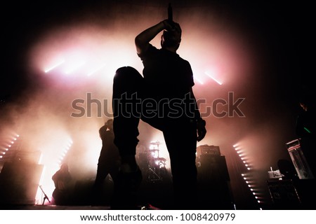 Similar – Image, Stock Photo Silhouette of male singer in studio