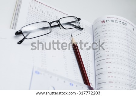Desktop of the manager at office. Reporting documents with information on statistics. Accounts department of office. Consignment note and account documentation.
