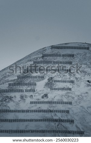 Similar – Image, Stock Photo A barrier and footprints in the slush