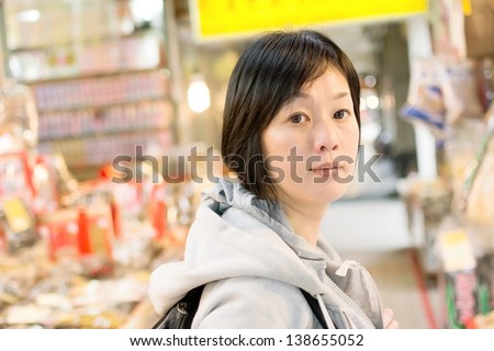 http://image.shutterstock.com/display_pic_with_logo/327857/138655052/stock-photo-mature-asian-women-in-sport-dress-walk-at-modern-street-in-taipei-taiwan-asia-138655052.jpg