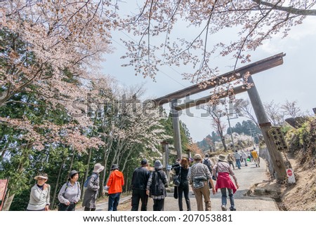 YOSHINO, JAPAN - April 17th : Tourists walking toward Yoshino Mountain, Yoshino, Nara, Japan on April 17th, 2014. Yoshino was famous place for sakura.