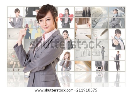 Attractive Asian business woman standing in front of TV screen wall, closeup portrait.