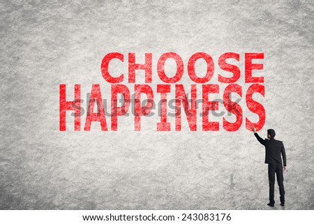 Asian businessman write text on wall, Choose Happiness