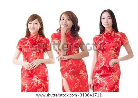Group of Chinese women dress traditional cheongsam at New Year, studio shot isolated on white background.