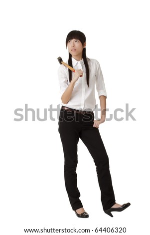 Angry business woman holding hammer on shoulder isolated over white.