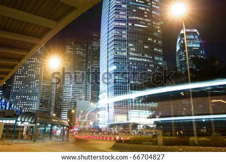 Night scene of buildings with light of cars motion blurred in Hong Kong, Asia.