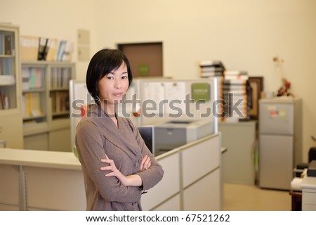 Successful mature business woman, closeup portrait in office.
