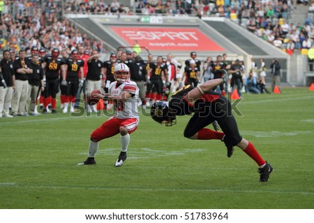 DUSSELDORF, GERMANY - APRIL 24: The 1st German Japan Bowl. Japan makes first catch of the ball and unfortunately for Germany , the interception failed as the player fell. On April 24, 2010 in Dusseldorf, Germany