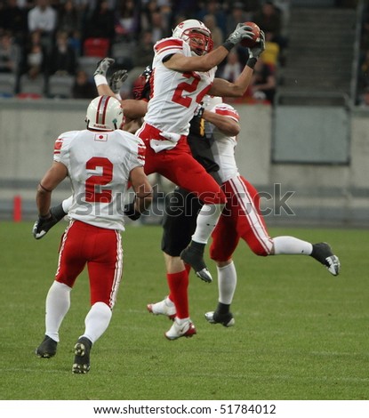 DUSSELDORF, GERMANY - APRIL 24: The 1st German Japan Bowl. The action that lead to Japans last touch-down gathers momentum. On April 24, 2010 in Dusseldorf, Germany