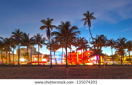 Miami Beach, Florida  hotels and restaurants at sunset on Ocean Drive, world famous destination for it\'s nightlife, beautiful weather and pristine beaches