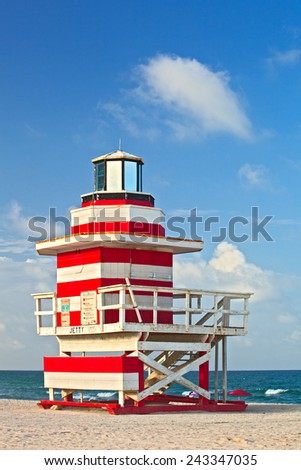 Miami Beach Florida, red and white Art deco lifeguard house on a beautiful summer day with blue sky in the background