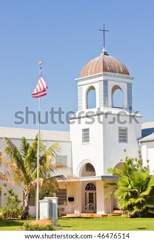 Separation of Church and state concept, American flag and a christian church