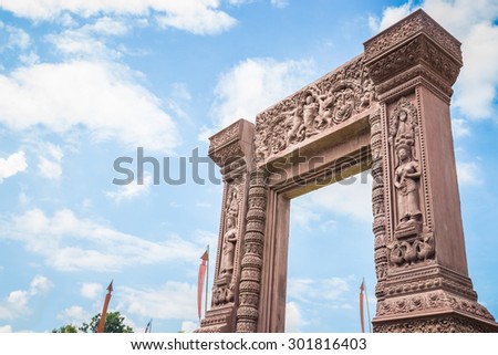 Ancient khmer style gate with sunny day