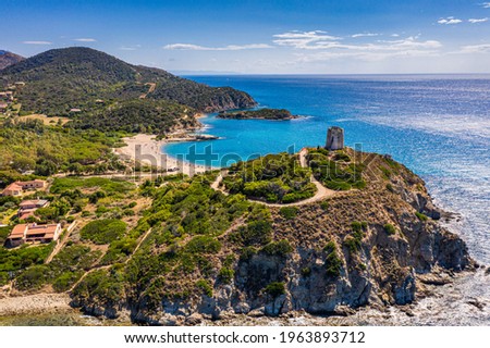 Torre di Chia view from flying drone. Acropoli di Bithia with Torre di Chia tower on background. Aerial view of Sardinia island, Italy, Europe. Panorama Of Chia Coast, Sardinia, Italy.  Stock fotó © 