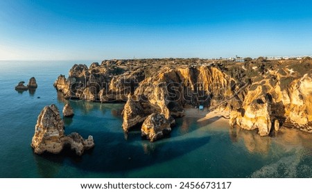 Similar – Image, Stock Photo Picturesque view of sandy beach at sunset