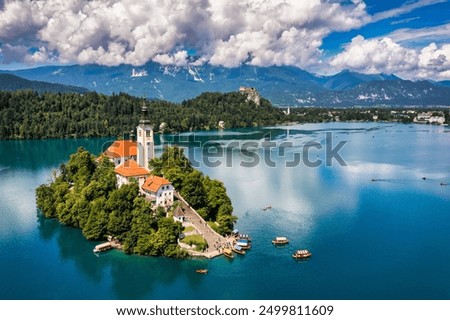 Similar – Image, Stock Photo Lake Bled and island with church and castle on the rock in the background in summer, Slovenia, Europe