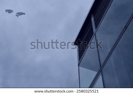 Similar – Image, Stock Photo Gloomy skyscraper facade with graphically cut hedge plant