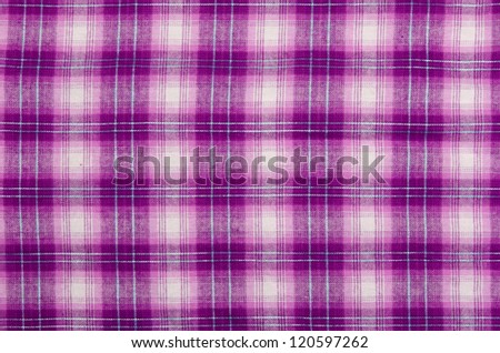 Purple cloth, checkered background.