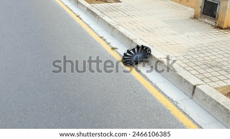 Similar – Image, Stock Photo car wheel lies on the side of the road covered with a thick layer of snow