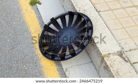 Similar – Image, Stock Photo car wheel lies on the side of the road covered with a thick layer of snow