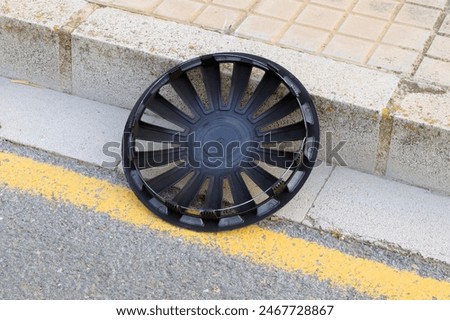 Similar – Image, Stock Photo car wheel lies on the side of the road covered with a thick layer of snow