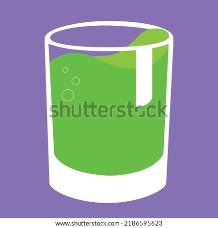 glass with green liquid on purple background