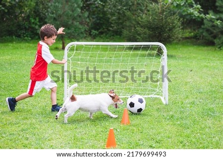 Image, Stock Photo Sportsman training on backyard and watching tutorial on laptop