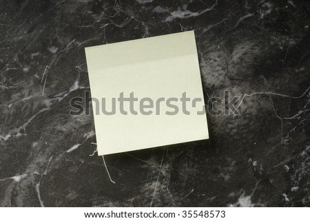 sticky note pasted on the marble to text