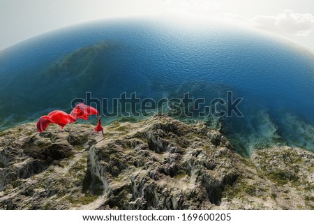 woman with a red tissue on the beach