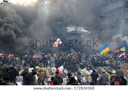 KIEV, UKRAINE - JANUARY 23, 2014: Anti-government protest in Kiev,  Grushevsky str.  People defend barricades.