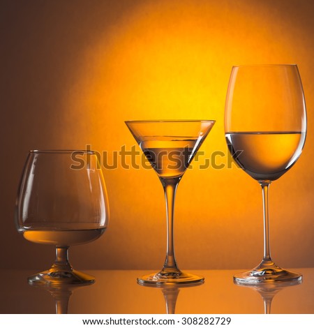 bar glasses  on orange background