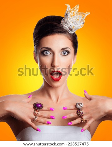 Beauty Girl Portrait with Colorful Makeup, Nail polish and Accessories. Colourful Studio Shot of Funny Woman. Vivid Colors. Colourful Manicure and fashion Hairstyle. Rainbow Colors. Beautiful lady